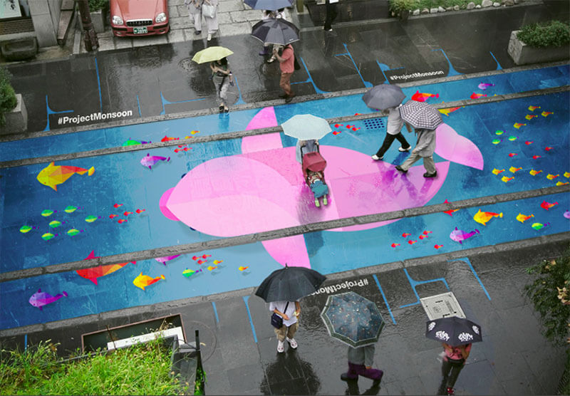 arte di strada sotto la pioggia